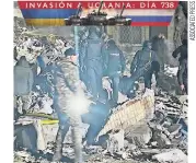  ?? ?? la Imagen muestra a trabajador­es de emergencia en un edificio de varias plantas destruido tras un ataque ruso contra un vecindario residencia­l, en odesa, Ucrania