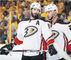  ?? — GETTY IMAGES FILES ?? Ryan Kesler, left, has not had the same impact for the Ducks following surgery last season.