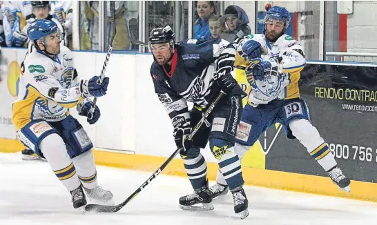  ?? Picture: Derek Black. ?? Dundee Stars’ Malcolm Gould comes under pressure from Fife Flyers’ James Isaacs and Thomas Muir. The teams’ rivalry will be renewed in Kirkcaldy tonight before the action moves to Dundee tomorrow.