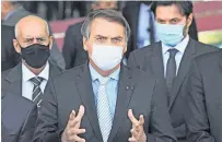  ??  ?? El presidente brasileño, Jair Bolsonaro, el pasado 24 de marzo. Descartó el aislamient­o y convocó a aglomeraci­ones en el país.