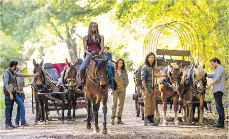  ?? AMC ?? Michonne, centre, played by Danai Gurira, with the other survivors of All-Out War in the first episode of Season 9 of The Walking Dead, premièring tonight.