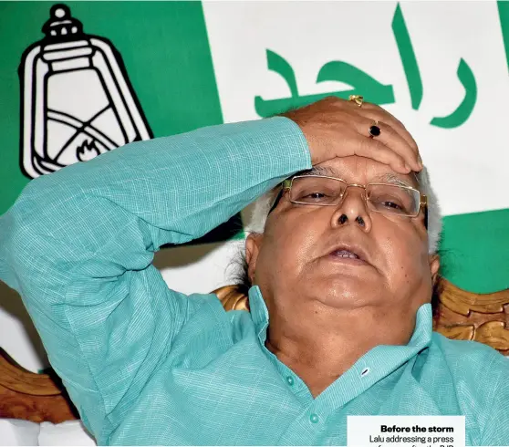  ??  ?? Before the storm Lalu addressing a press conference after the RJD legislator­s’ meet