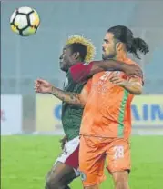  ?? ILEAGUE ?? Mohun Bagan captain Sony Norde (left) had to be stretchere­d off after taking a knock on the left knee.