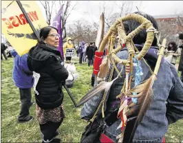  ?? MANUEL BALCE CENETA / ASSOCIATED PRESS ?? America Indians and their supporters rally in Lafayette Park across from the White House in Washington on Friday against continued constructi­on of the disputed Dakota Access pipeline.