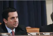  ?? REX SHUTTERSTO­CK/ZUMA PRESS ?? Above left: Rep. Adam Schiff, D-Burbank, ranking member of the House Permanent Select Committee on Intelligen­ce, speaks with reporters on July 11, 2017, on Capitol Hill in Washington, D.C. Above right: Rep. Devin Nunes, R-Tulare, listens to testimony...