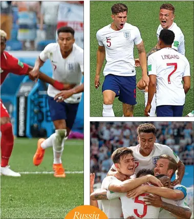  ??  ?? It’s Kane sailing: the captain blasts his first penalty into the top corner to put England 2-0 up after John Stones (left) headed in a corner from Kieran Trippier and Harry Maguire and Jesse Lingard lead the celebratio­ns (below)