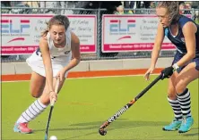  ??  ?? DERBY GAME: Collegiate’s Taz Preller, left, and Reagan Jacobs, of Rhenish, during the two schools’ hockey clash