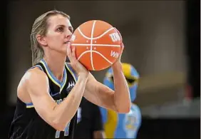  ?? Stacy Revere / Getty Images ?? Chicago’s Allie Quigley competes in the 3-point contest on Saturday. Quigley, the defending champion, earned the win for a record fourth time.