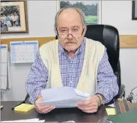  ?? CAPE BRETON POST PHOTO ?? Defense lawyer Bill Burchell sits at his desk in his Sydney Mines office in this file photo. Burchell said he doesn’t think the new proposed changes to the impaired driving laws will affect his job much, but he does find the proposal to have mandatory alcohol screening “offensive.”