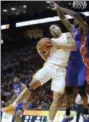  ?? JOY KIMBROUGH — THE DAILY TIMES VIA AP ?? Tennessee forward Grant Williams (2) rebounds the ball against Florida during an NCAA college basketball game, Saturday in Knoxville, Tenn.