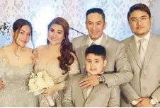  ?? ?? Jovy with his wife Det and their children Lars, Rafi and Rocky Hernandez during the couple’s silver wedding anniversar­y.