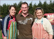  ??  ?? Sarah Doona, Cormac Clifford and Liz Lucey working at the Threshing Cancer in Beaufort on Sunday.