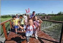  ?? PROVIDED TO CHINA DAILY ?? Children visit the Huaifang Water Reclamatio­n Plant during an open day organized by the Beijing Drainage Group on Aug 24, 2017.