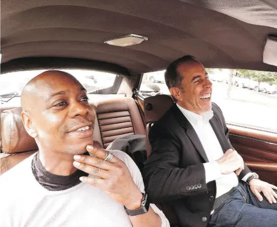  ?? NETFLIX ?? Dave Chappelle, left, and Jerry Seinfield yuk it up in Comedians in Cars Getting Coffee, which is now streaming on Netflix.