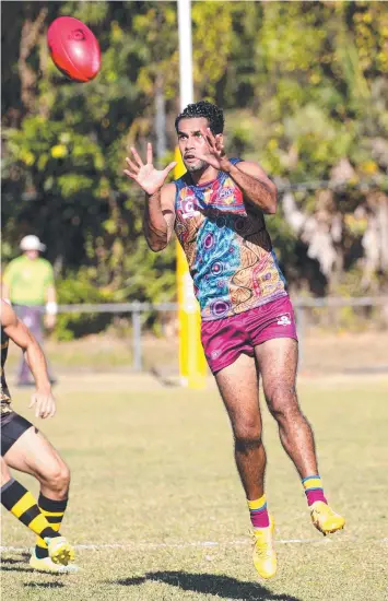  ?? Picture: STEWART MCLEAN ?? BIG GAME: AFL Cairns’ Dreamtime by the Sea game will take place in Round 8 this season. Cairns City Lions' Aaron Davey is pictured in last year’s contest.