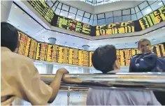  ??  ?? Foreign investors are slowly gaining confidence in the local equity market as Pakatan Harapan government’s policies and direction become clearer as its 100 days milestone approaches, analysts say. — AFP photo