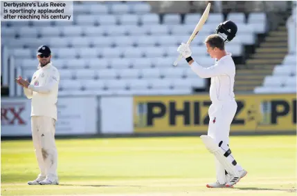  ??  ?? Derbyshire’s Luis Reece is sportingly applauded after reaching his century