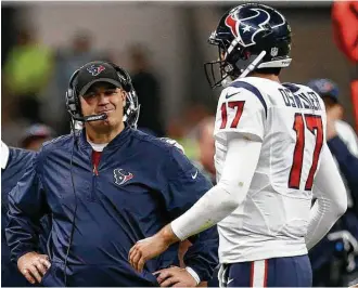  ?? Brett Coomer / Houston Chronicle ?? After watching Broncos game film, Texans coach Bill O’Brien, left, was impressed Brock Osweiler, right, stayed in the pocket to deliver the ball under pressure. Did last season tell a different tale?