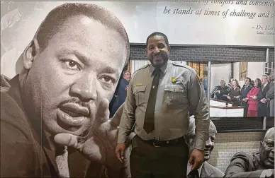  ?? COURTESY OF CAPITAL B ?? Martin Luther King Jr. National Historical Park’s Ranger Marty Smith says it is important that families bring children to the center. “The history needs to be learned,” he says.