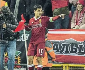  ?? FOTO: EFE ?? Coutinho celebra su primer hat-trick con el Liverpool en Champions League