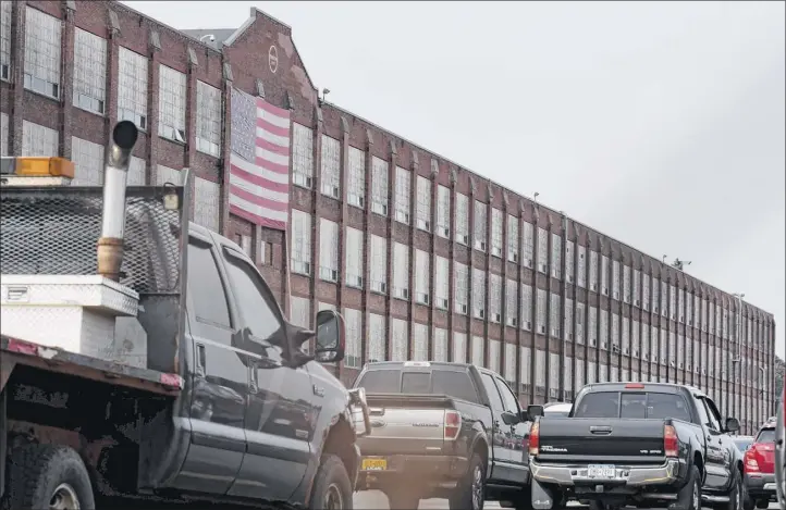  ?? Photos by Will Waldron / Times Union ?? Exterior of the Remington Arms Co. manufactur­ing plant on Thursday in Ilion. Remington filed for bankruptcy in July. The fate of the gun manufactur­ing facility is uncertain.