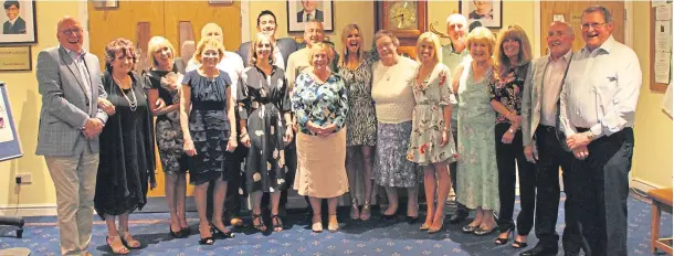  ??  ?? LIFELINE: Geoff Bollands and his wife, Christine, with their wider family, together after working through the trauma suffered following the Piper Alpha disaster