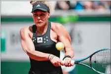  ?? THIBAULT CAMUS/AP PHOTO ?? France’s Leolla Jeanjean plays a shot against Karolina Pliskova of the Czech Republic during their second round match at the French Open on Thursday in Roland Garros stadium in Paris, France.