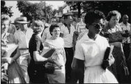  ??  ?? “It was not the plan for Elizabeth Eckford to walk alone toward Central High,” 1957 (silver gelatin print, 1997) was part of the exhibition “Will Counts: The Central High School Photograph­s” at the Arkansas Arts Center (now the Arkansas Museum of Fine Arts).