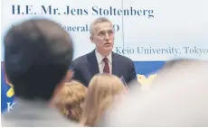  ?? — AFP photo ?? Stoltenber­g giving a speech during a visit to Keio University in Tokyo.