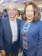  ??  ?? Jollibee Foods Corp.’s William Tan Untiong with Elizabeth Sy.