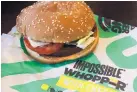  ?? BEN MARGOT/ASSOCIATED PRESS ?? An Impossible Whopper burger is photograph­ed at a Burger King restaurant in Alameda, Calif..
