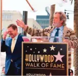  ??  ?? Actor John Goodman (L) reacts as actor Jeff Bridges speaks at Goodman's star unveiling ceremony on the Hollywood Walk of Fame, March 10, 2017, in Hollywood, California. — AFP