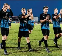  ??  ?? SALUTE: Athlone Town players looked united, despite an unsettling week for the struggling Midlands club, as they left the pitch on Friday evening after recording a convincing victory over visiting Cobh Ramblers in their First Division clash