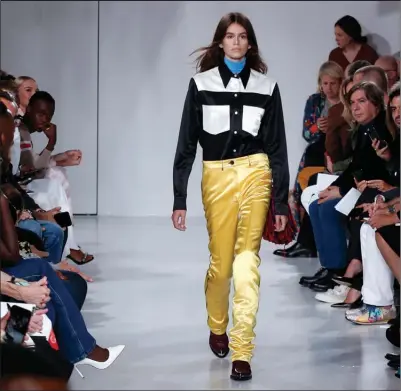  ?? THE ASSOCIATED PRESS ?? Kaia Gerber, daughter of model Cindy Crawford, walks the runway at the Calvin Klein 2018 Spring/Summer fashion show during Fashion Week.