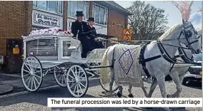  ?? ?? The funeral procession was led by a horse-drawn carriage