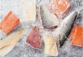  ?? DEB LINDSEY/FOR THE WASHINGTON POST ?? Look for packages of reduced-oxygen packaging frozen fillets, like these sockeye salmon, sea bass, Atlantic cod and tuna.