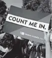  ?? Getty Images ?? A protester outside the Supreme Court as justices mull Trump administra­tion’s bid to add citizenshi­p question to the census.