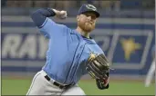  ?? STEVE NESIUS — THE ASSOCIATED PRESS ?? Tampa Bay Rays starter Drew Rasmussen pitches against the Baltimore Orioles during the first inning of a baseball game Sunday in St. Petersburg, Fla.