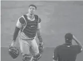  ?? ADRIAN KRAUS/AP ?? Yankees catcher Gary Sanchez looks to the sky after dropping a foul ball hit by the Blue Jays’ Cavan Biggio during a game Sept. 8 in Buffalo, N.Y.