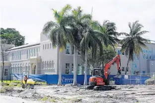  ?? TAIMY ALVAREZ/SOUTH FLORIDA SUN SENTINEL PHOTOS ?? Old Boynton High School, now under renovation to become the City’s Cultural Center, the first building to be completed within the Town Square 16-acre site, located in downtown Boynton Beach.
