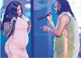  ??  ?? Cardi B (left) and Ozuma perform ‘La Modelo’ at the Billboard Latin Music Awards at the Mandalay Bay Events Center on Thursday, April 26, 2018, in Las Vegas.