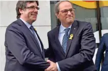  ?? REUTERS/Eric Vidal — ?? ON A MISSION: Pro-independen­ce Catalan leader Quim Torra meets with former Catalan leader Carles Puigdemont at the Delegation of the Government of Catalonia in Brussels, Belgium, July 28, 2018.