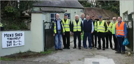  ??  ?? Some of the 14 members of Tinahely Men’s Shed outside their renovated premises.