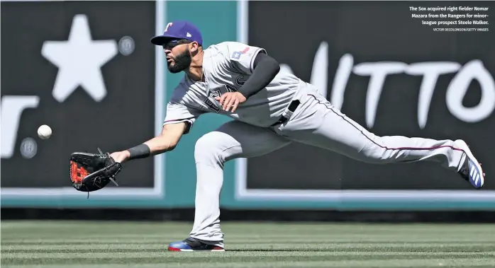  ?? VICTOR DECOLONGON/GETTY IMAGES ?? The Sox acquired right fielder Nomar Mazara from the Rangers for minorleagu­e prospect Steele Walker.