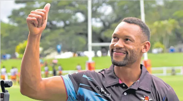  ?? Picture: ATU RASEA ?? Former England 7s speedster Dan Norton greets the crowd during day one of the McDonald’s Fiji’s Coral Coast 7s at Lawaqa Park in Sigatoka yesterday.