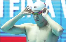  ?? — AFP photo ?? Sun Yang competes in the final of the men’s 200m freestyle event during the swimming competitio­n at the World Championsh­ips at Nambu University Municipal Aquatics Centre in Gwangju, South Korea in this July 23 file photo.