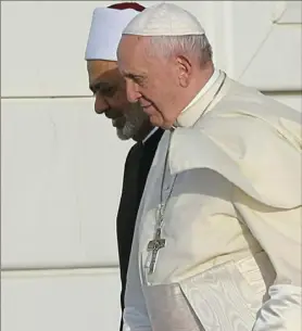  ?? Kamran Jebreili/Associated Press ?? Pope Francis, right, and the Grand Imam of Al Azhar, Ahmed el-Tayeb, arrive at the Sheikh Zayed Grand Mosque in Abu Dhabi, United Arab Emirates, on Monday. See story on