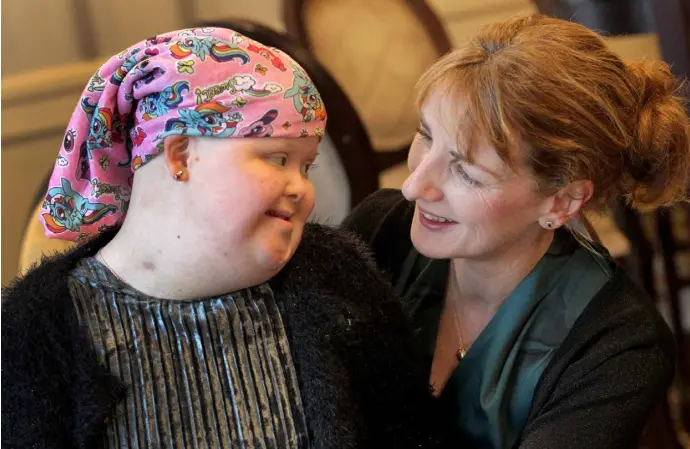  ??  ?? LIFE ON HOLD: Leitrim Carer of the Year Mary Doherty and her 12-year-old daughter, Niamh. Photo: Mark Stedman