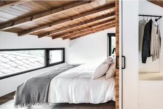  ??  ?? Unten Dieses Schlafzimm­er zeichnet sich durch einen zeitlosen Stil aus. Die Holzbalken­decke lehnt an traditione­lle Architektu­r der Region an.