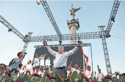  ?? GARY CORONADO/LOS ANGELES TIMES/TRIBUNE NEWS SERVICE ?? Andres Manuel Lopez Obrador, the front-runner in today’s Mexican presidenti­al election, campaigns in the city of Chihuahua.